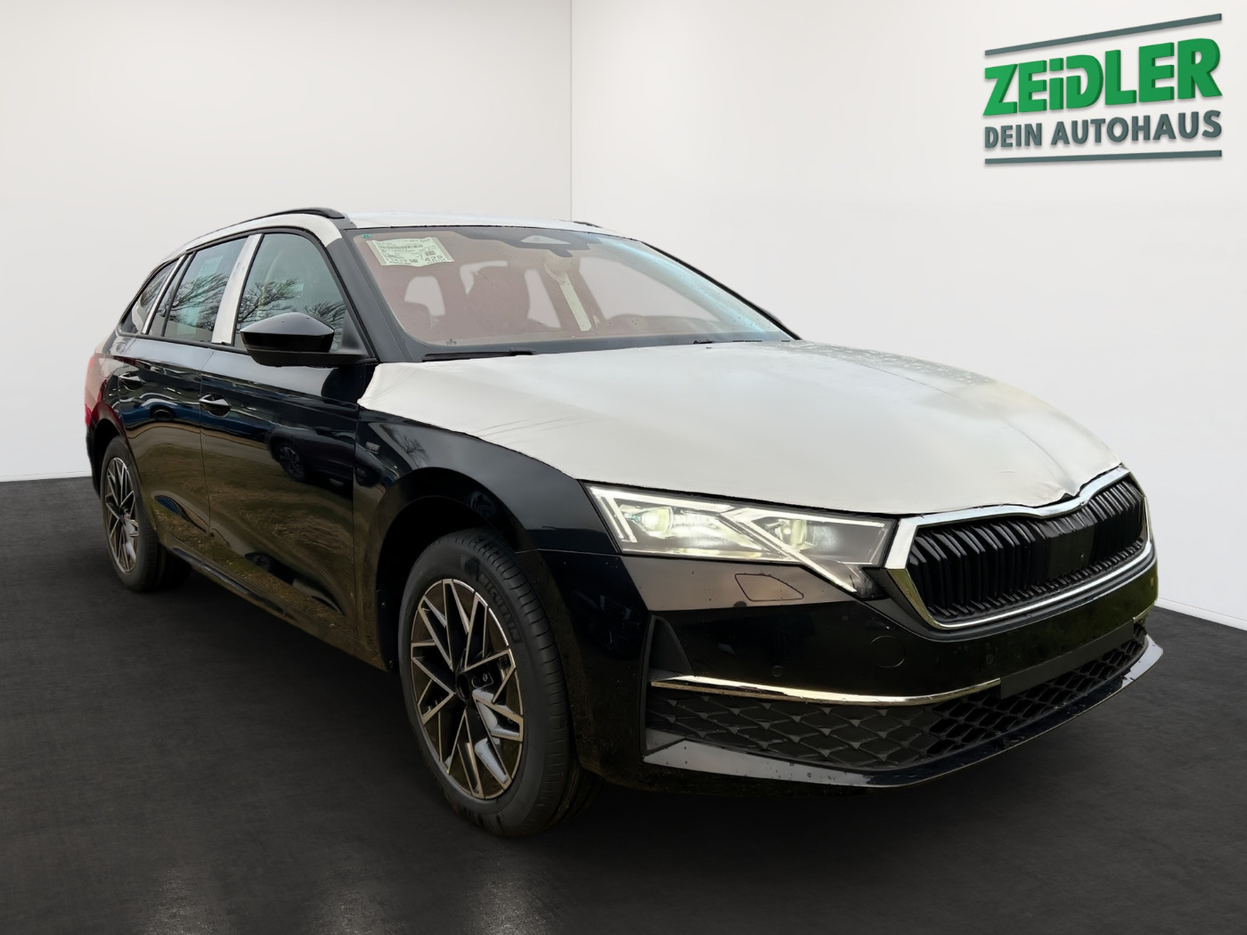 Škoda Octavia Combi 2.0 TDI  W Tour Navi 360 4xSHZ ACC Bild 2