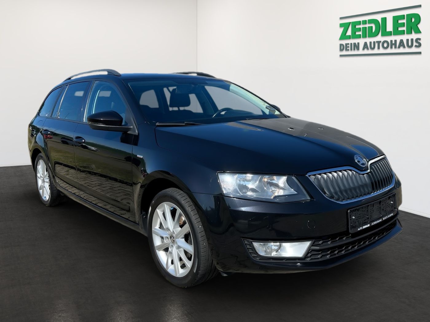 Škoda Octavia Combi Joy 1,6 TDI Green Tec LM Navi PDC Bild 2